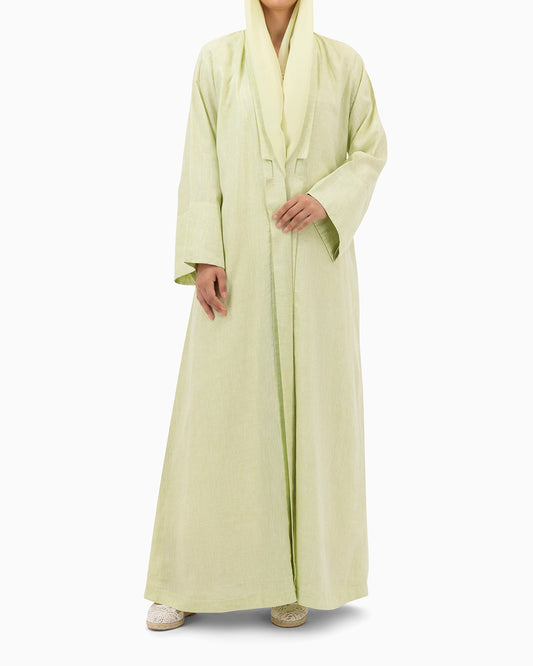Model wears Pastel Green Linen Abaya